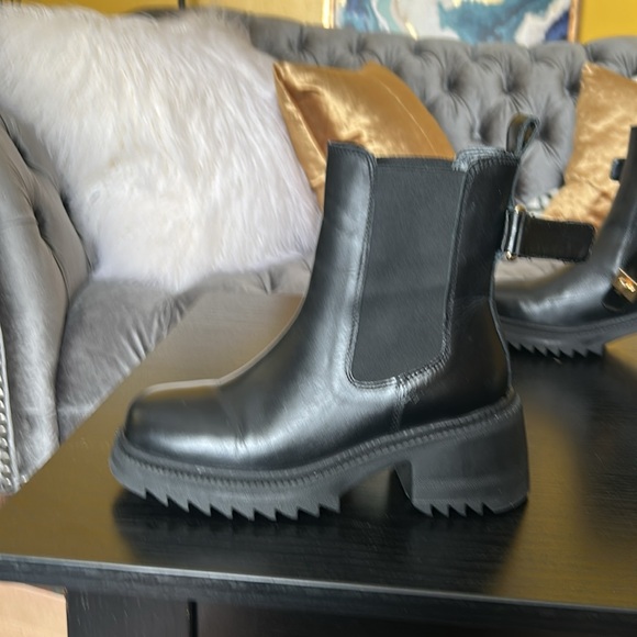 Steve Madden Black Leather Ankle Boots with gold accent. - Picture 2 of 15